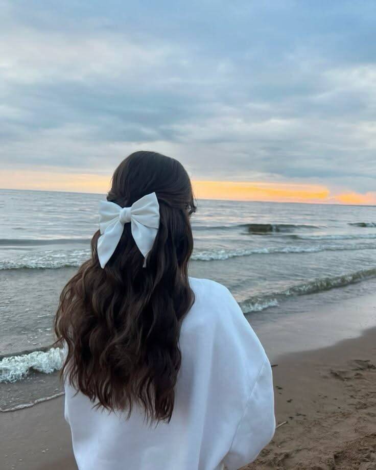 Aesthetic pfp Profile Picture with Long Hair and White Bow at the Beach