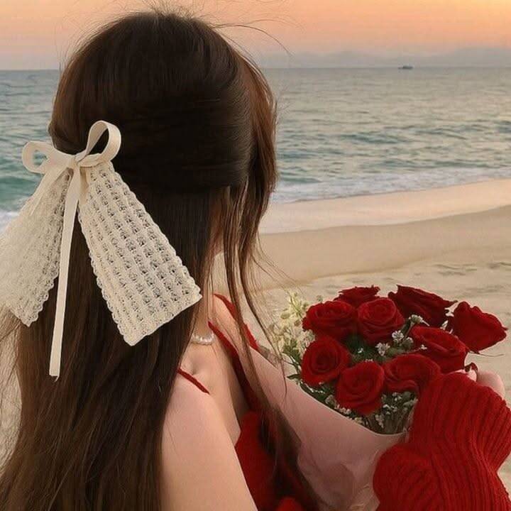 Aesthetic pfp Profile Picture with Hair and Flowers at the Beach