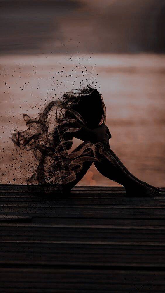Sad pfp Profile Picture of Woman Sitting with Head Down
