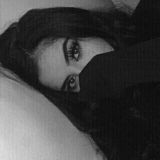 Striking Eyes and Elegant Style pfp Profile Picture