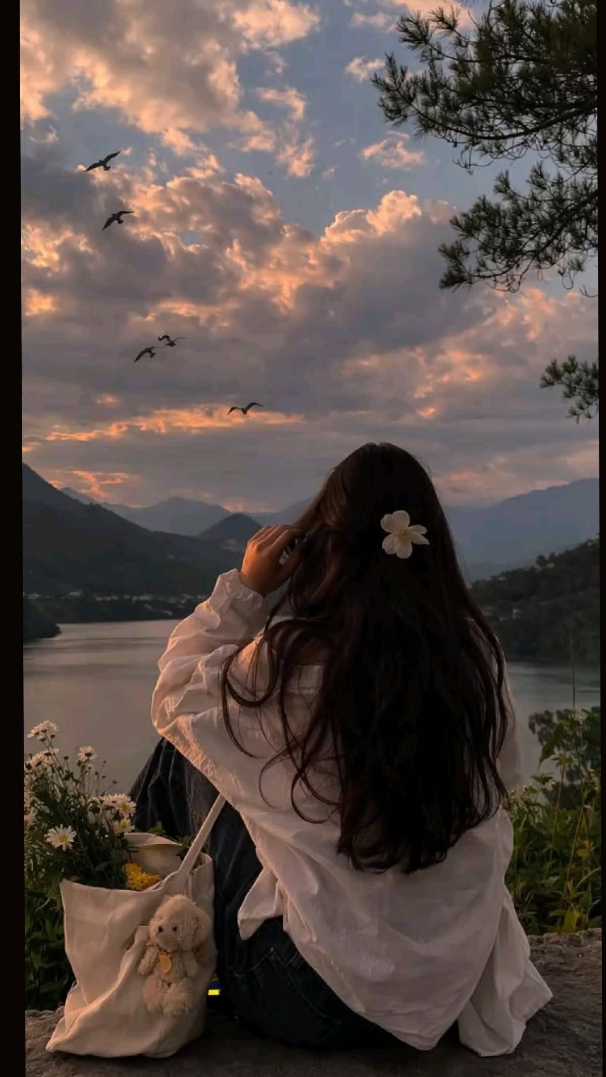 Aesthetic pfp Profile Picture at Sunset with Flowers and Mountains