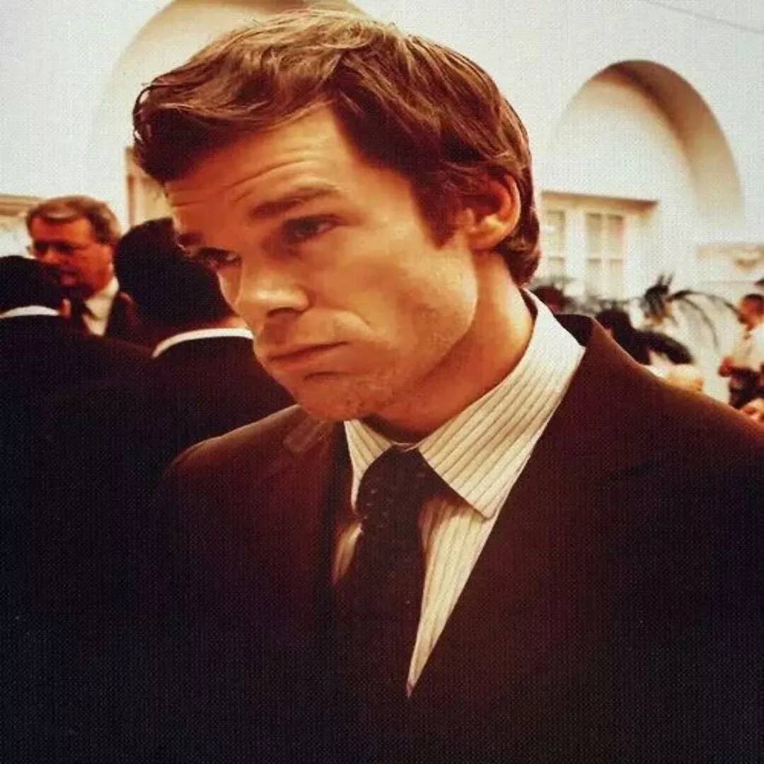 Dexter pfp Profile Picture Serious Expression in Formal Attire