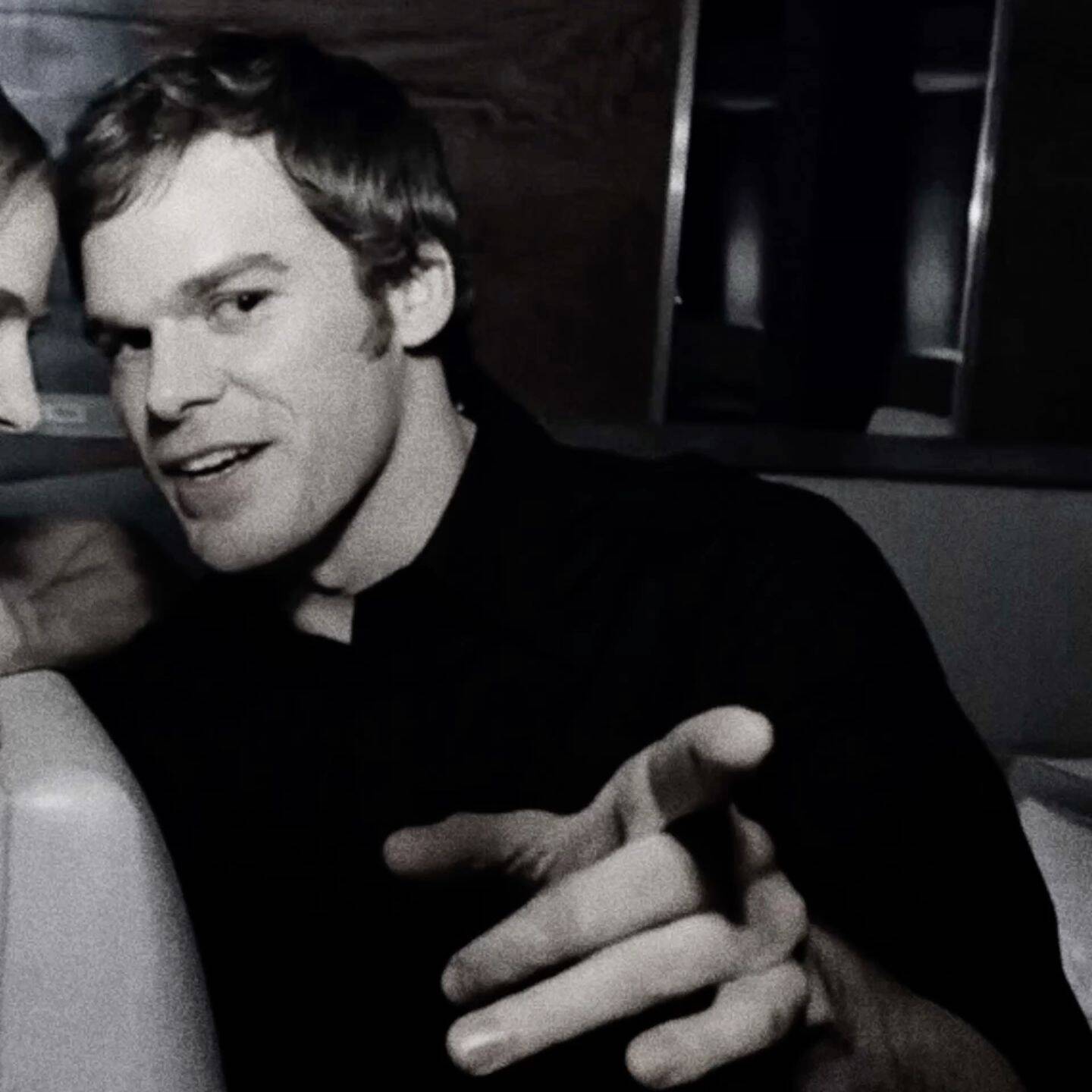 Dexter pfp Profile Picture with Thoughtful Expression and Finger Gesture