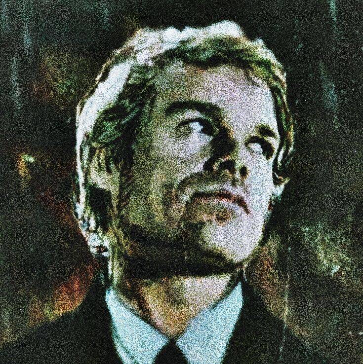 Dexter pfp Profile Picture with Intense Expression and Stylish Suit