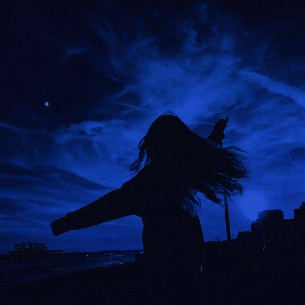 Blue pfp Profile Picture Silhouette Against Dramatic Sky