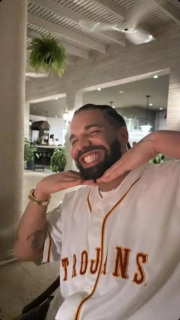 Drake pfp Profile Picture Smiling with Trojans Jersey