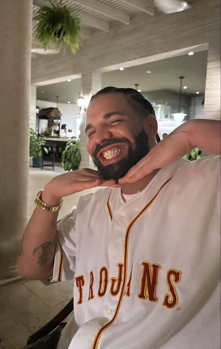 Drake pfp Profile Picture Smiling with Trojans Jersey